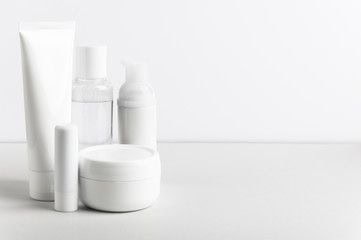 IMG_5983 Modern skincare product containers including tubes, bottles, and jars for personalized cosmetic formulations and skincare solutions.